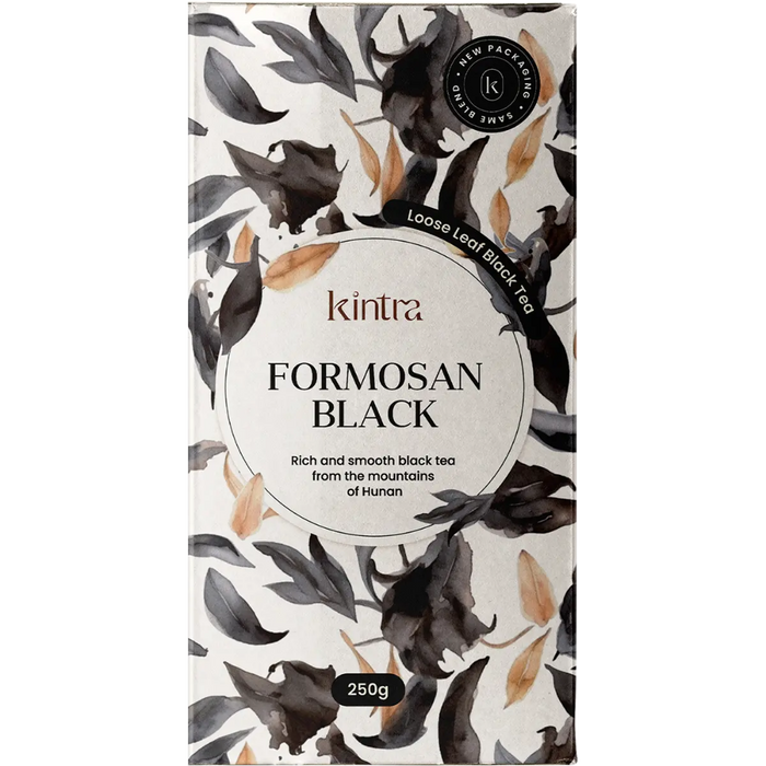 A 250g package of kintra Formosan Black loose leaf black tea, featuring a white background decorated with black and brown watercolor leaves.