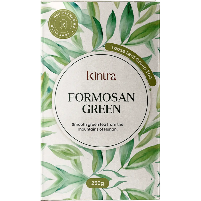 Kintra Formosan Green loose leaf tea packaging box, featuring a watercolor green leaf pattern on a white background with a central circular label.