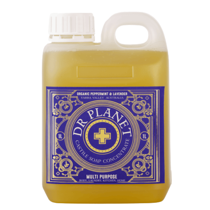 Dr. Planet Castile Soap Concentrate bottle with yellow liquid and purple label on a white background