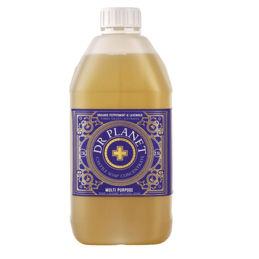 Dr. Planet multi-purpose all-natural soap concentrate bottle with a purple label in a clear plastic jug